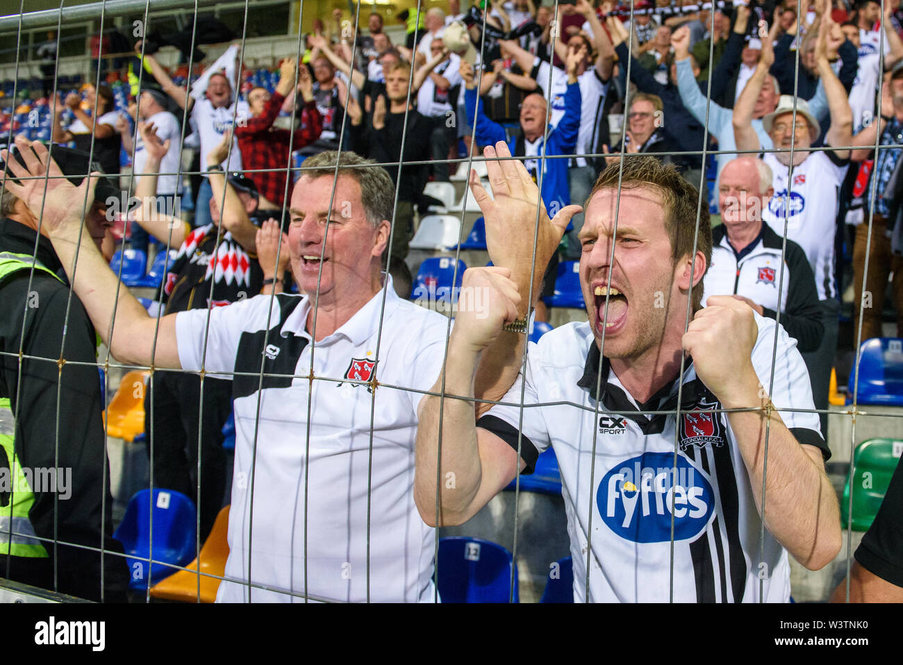 Riga, Latvia. 17th July 2019. DUNDALK FC fans after their team win at penalties, during UEFA Champions League 1st round 2nd leg football game between RIGA FC and DUNDALK FC. Skonto stadium, Riga Credit: Gints Ivuskans/Alamy Live News Stock Photo