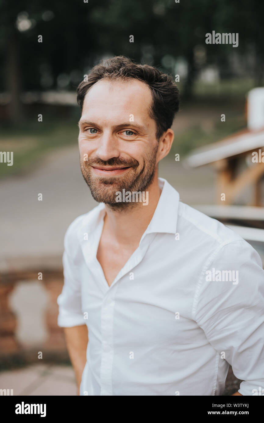 positive bearded caucasian man smiling Stock Photo