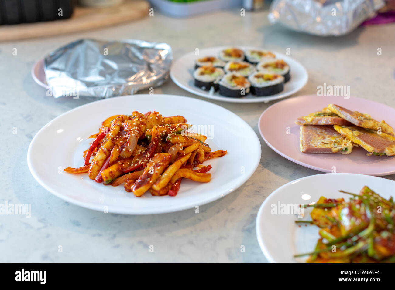 Delicious spicy stir fried squid on a plate, Banchan, Korean food Stock