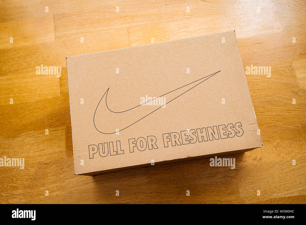 Paris France - Jul 7 2019: Man hand Above view unboxing unpacking sport  running shoes equipment manufactured by Nike sportswear - Pull for  freshness and logotype Stock Photo - Alamy