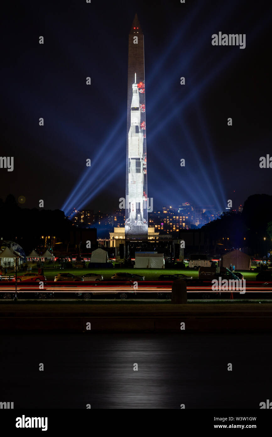 Saturn V rocket projected onto the Washington Monument during the Smithsonian celebration of the 50th Anniversary of the Apollo 11 moon landing in DC. Stock Photo