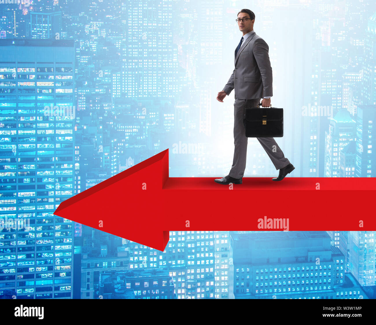 The businessman walking on arrow in business concept Stock Photo - Alamy