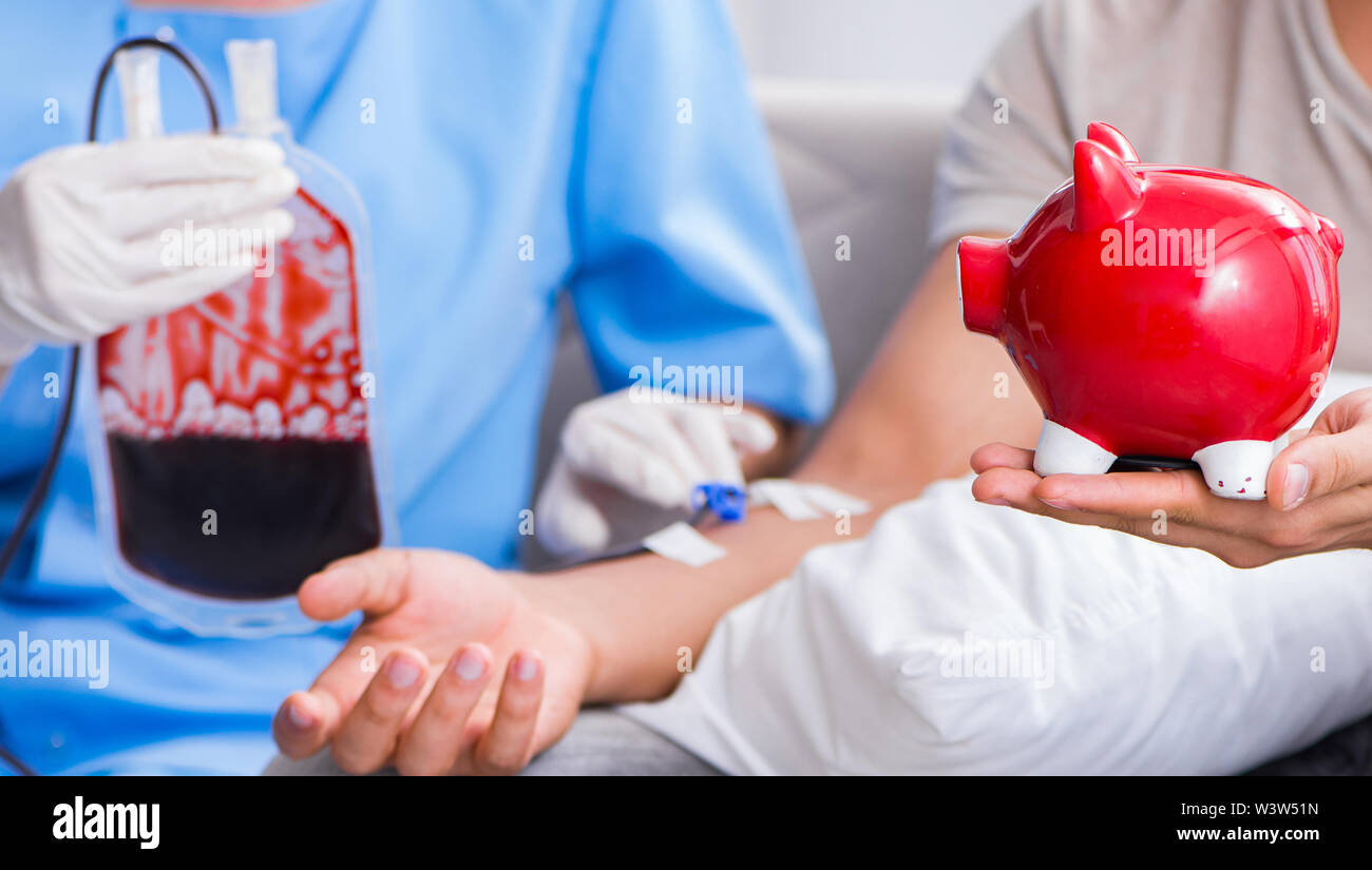 The patient getting blood transfusion in hospital clinic Stock Photo