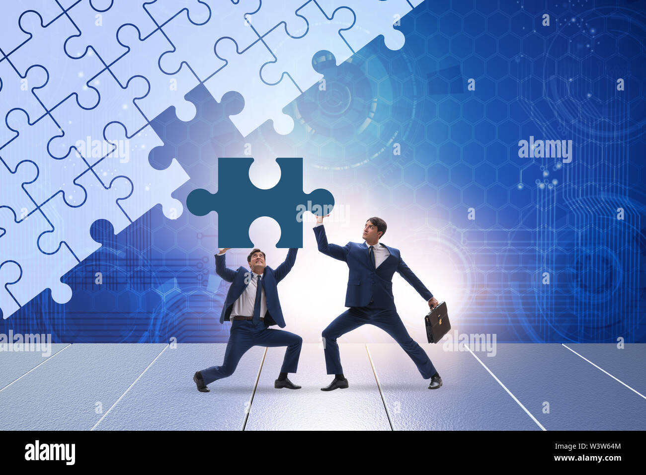 The concept of businessman with missing jigsaw puzzle piece Stock Photo ...