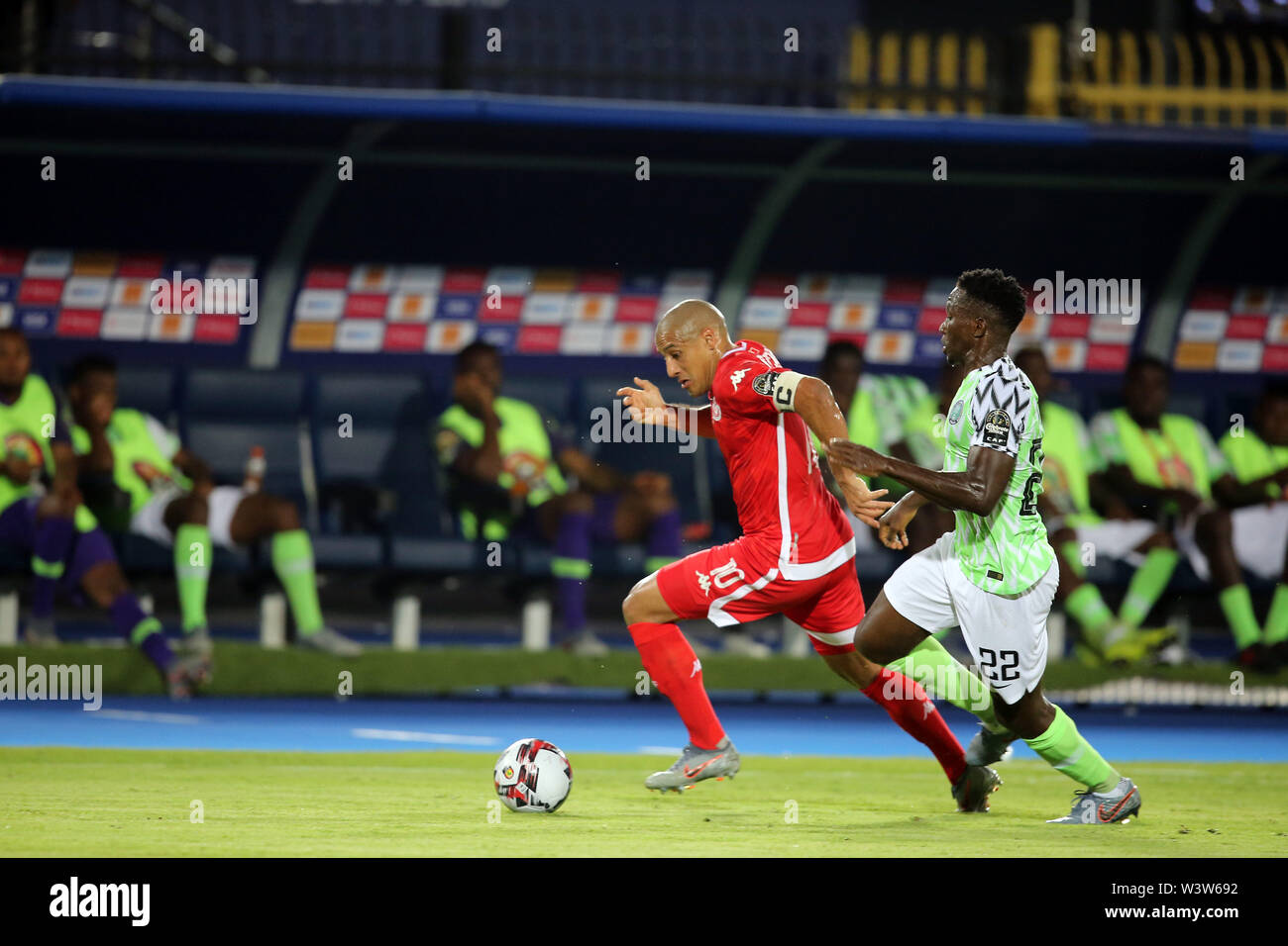 Cairo, Egypt. 17th July, 2019. Wahbi Khazri(10) of Tunisia in action with Kenneth Omeruo(22)of Nigeria during Tunisia vs Nigeria Match for third place at Al salam stadium in Cairo.Total Africa Cup of Nations Egypt 2019 .photo: Chokri Mahjoub Credit: Chokri Mahjoub/ZUMA Wire/Alamy Live News Stock Photo