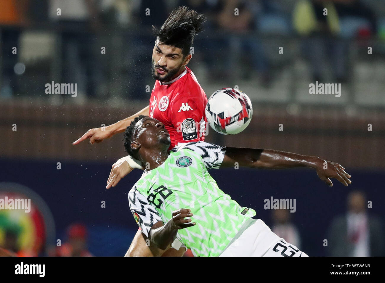 Cairo, Egypt. 17th July, 2019. Kenneth Omeruo (Bottom) of Nigeria vies with Ferjani Sassi of Tunisia during the third place final at the 2019 Africa Cup of Nations in Cairo, Egypt, July 17, 2019. Credit: Ahmed Gomaa/Xinhua/Alamy Live News Stock Photo
