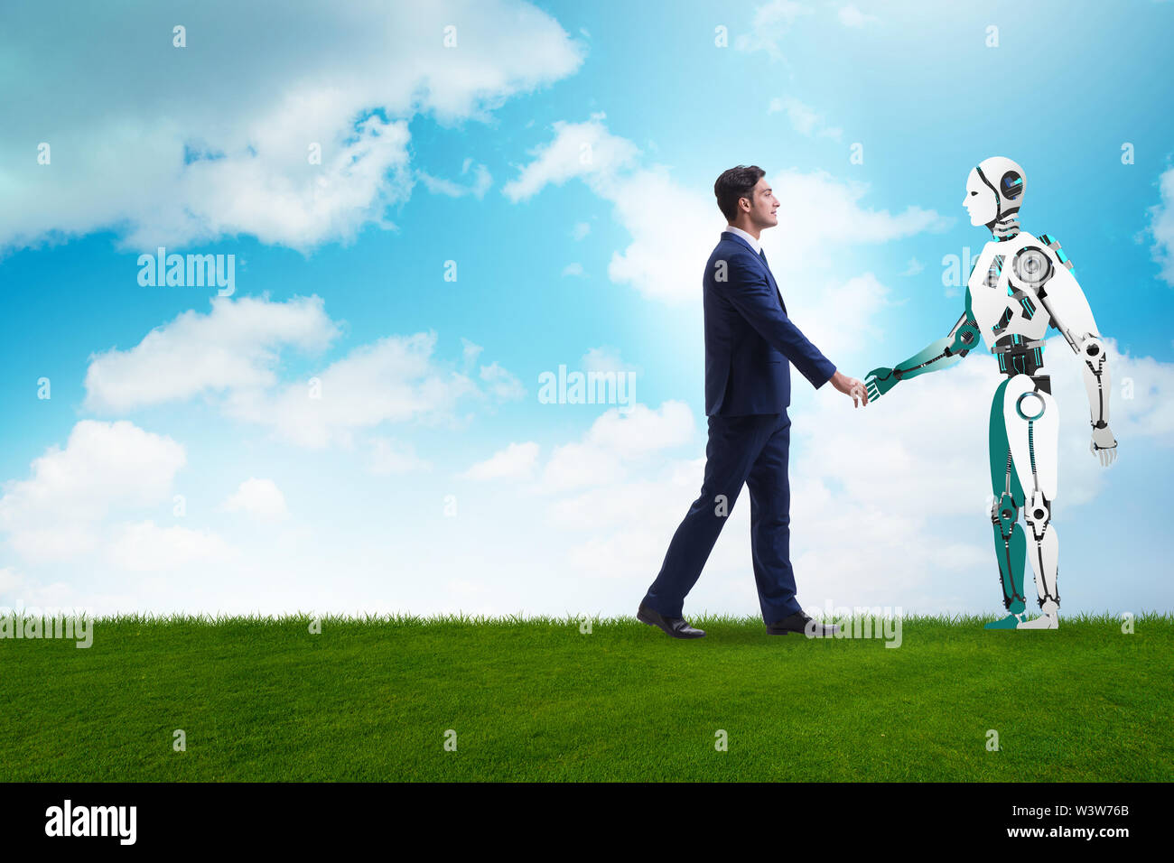 The Concept Of Cooperation Between Humans And Robots Stock Photo - Alamy