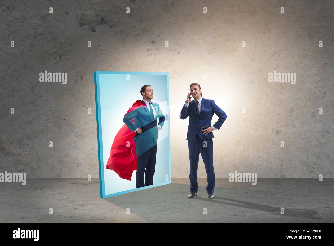 The businessman seeing himself in mirror as superhero Stock Photo - Alamy