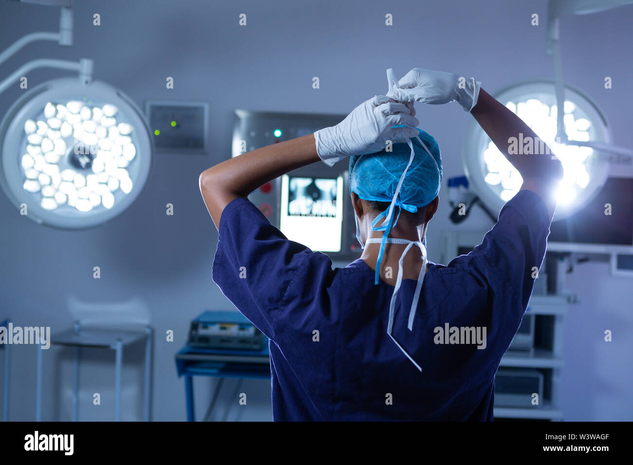 Female surgeon wearing surgical mask on in operating room at hospital Stock Photo Alamy
