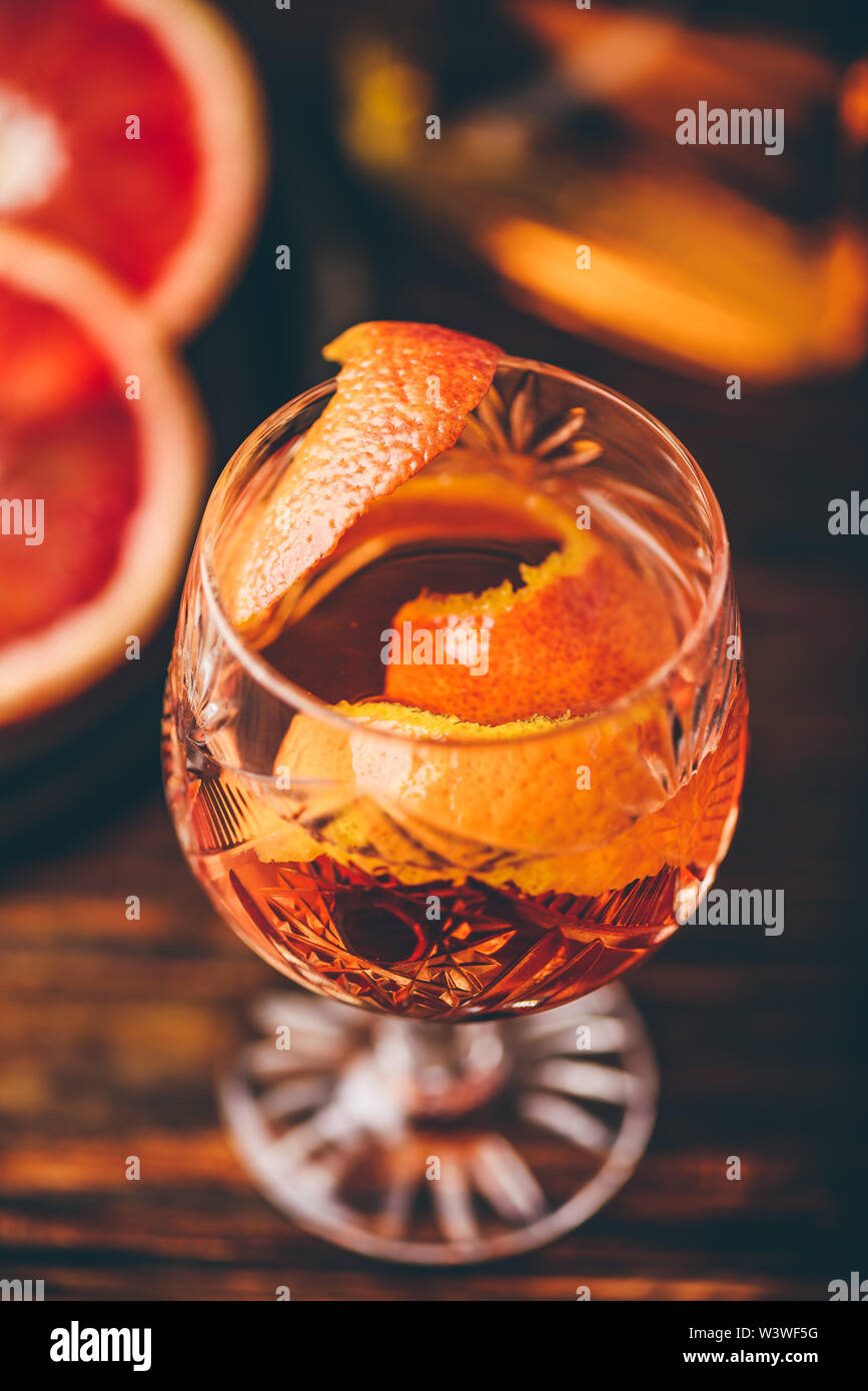 Orange whiskey sour cocktail with bourbon, blood orange juice and