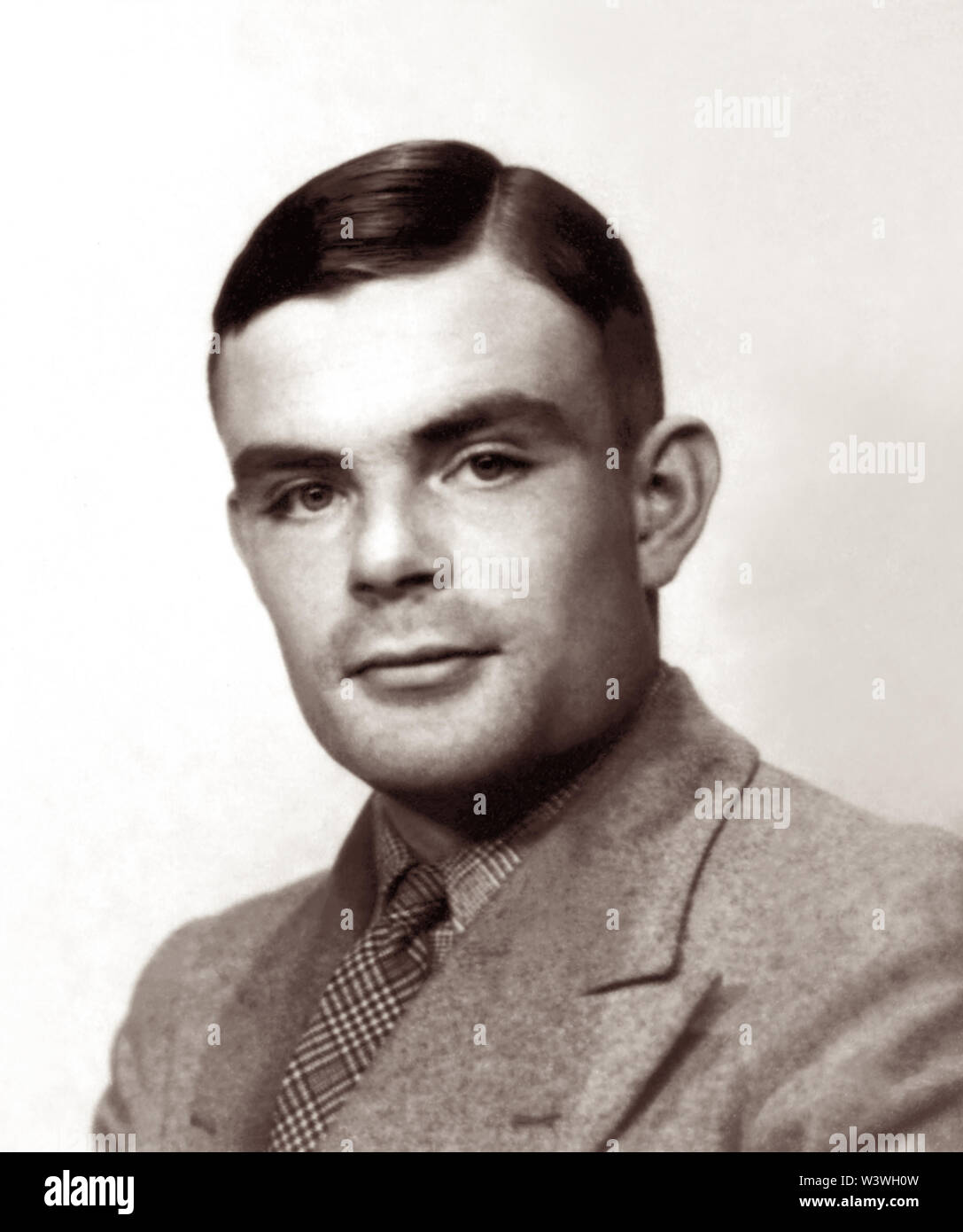 Alan Mathison Turing (1912-1954), a British mathematician, is widely considered to be the father of theoretical computer science and artificial intelligence. During World War II he worked for the Government Code and Cypher School at Bletchley Park, Britain's codebreaking center that produced Ultra intelligence. For a while Turing led Hut 8, the section responsible for German naval cryptanalysis. Turing played a pivotal role in cracking intercepted coded messages that helped enable the Allies to defeat the Nazis. (Photo circa 1930s) Stock Photo