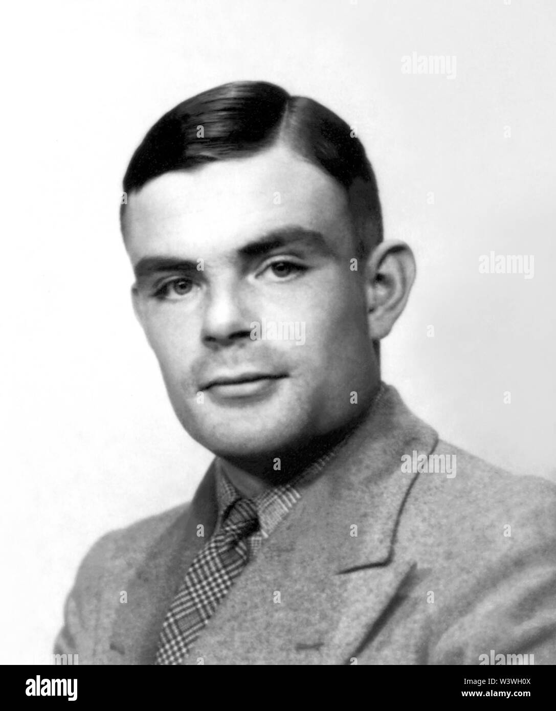 Alan Mathison Turing (1912-1954), a British mathematician, is widely considered to be the father of theoretical computer science and artificial intelligence. During World War II he worked for the Government Code and Cypher School at Bletchley Park, Britain's codebreaking center that produced Ultra intelligence. For a while Turing led Hut 8, the section responsible for German naval cryptanalysis. Turing played a pivotal role in cracking intercepted coded messages that helped enable the Allies to defeat the Nazis. (Photo circa 1930s) Stock Photo