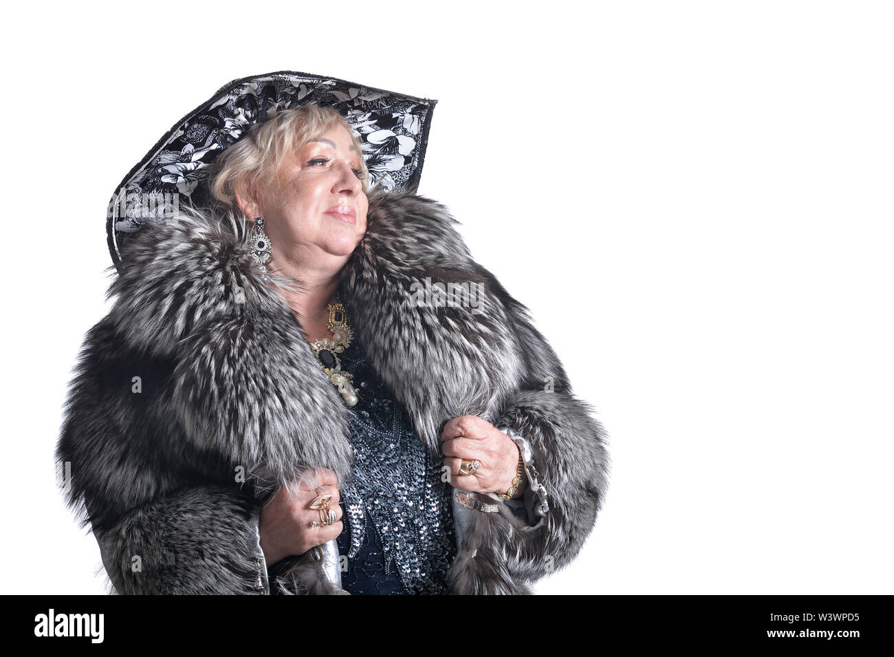 Older woman fur coat hi-res stock photography and images - Alamy