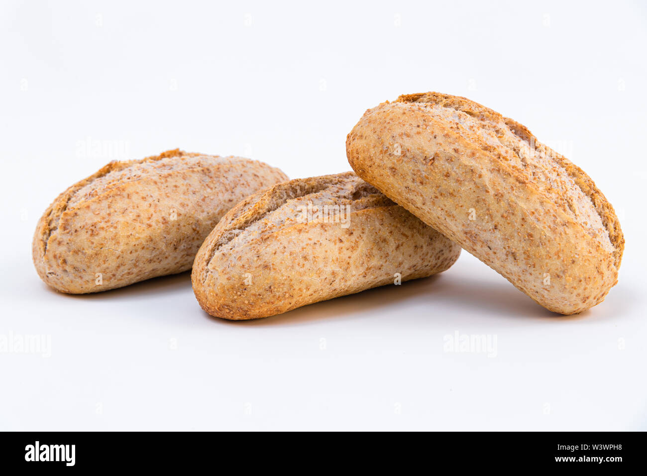 three cereal bread on white background. Food composition Stock Photo