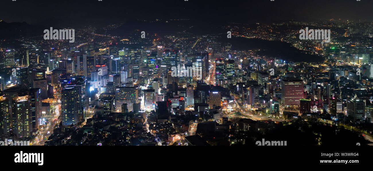 Aerial panoramic view of urban skyscrapersand central city  at night, Seoul, South Korea. Stock Photo