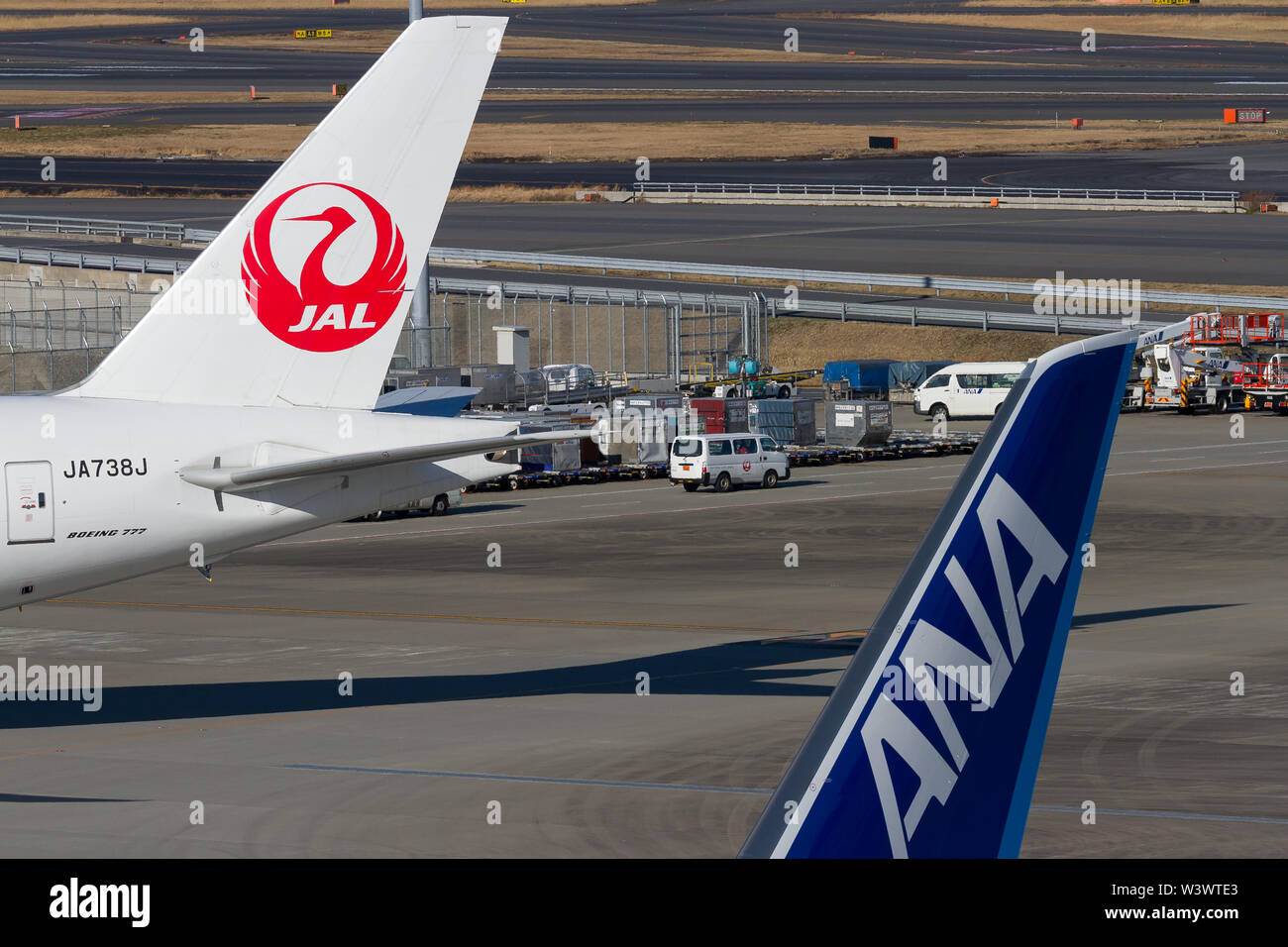 The tail planes of the two Japanese national airlines; Japan Airlines