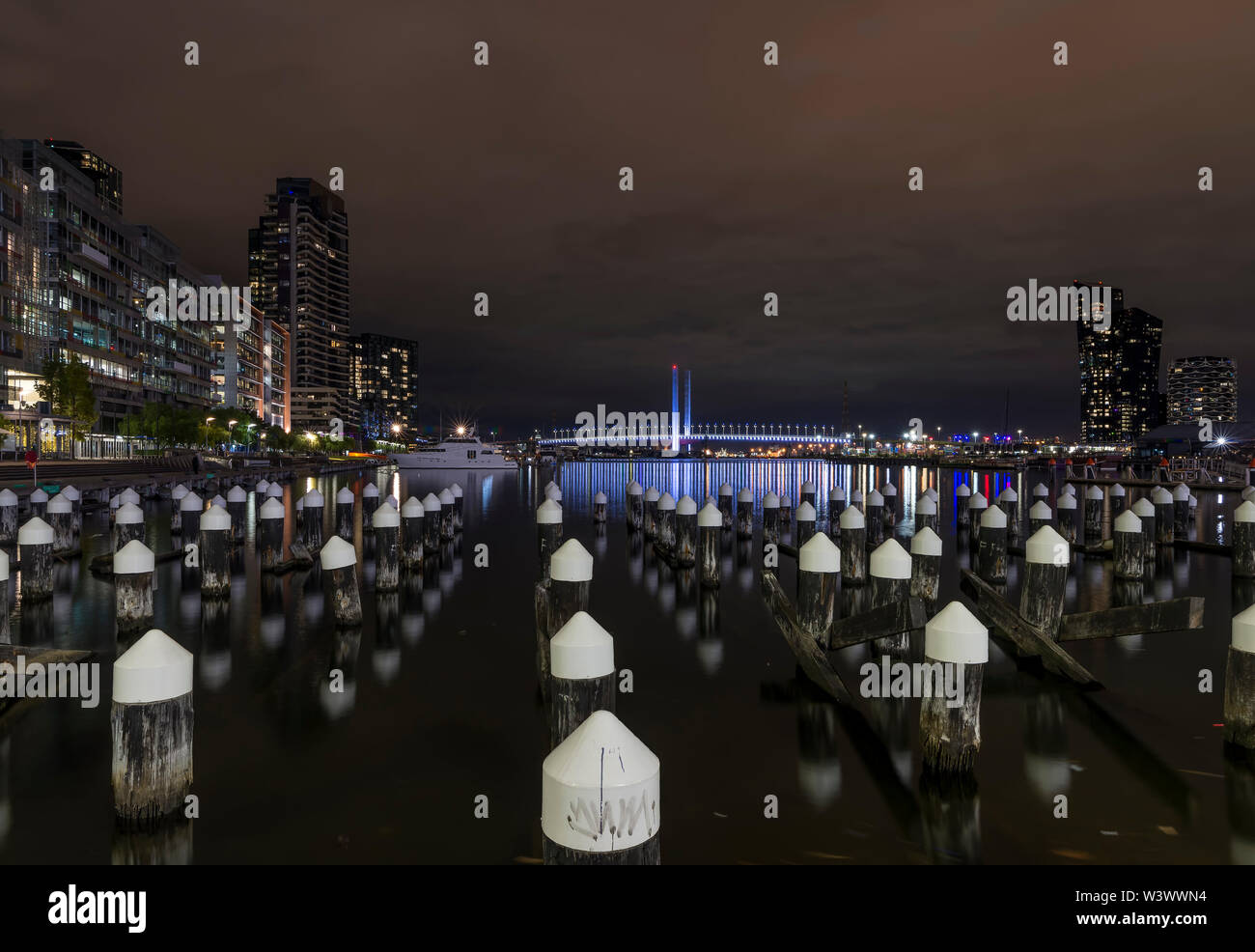 Beautiful night view of Melbourne docklands and Bolte Bridge, with reflections on the Yarra River, Melbourne, Australia Stock Photo