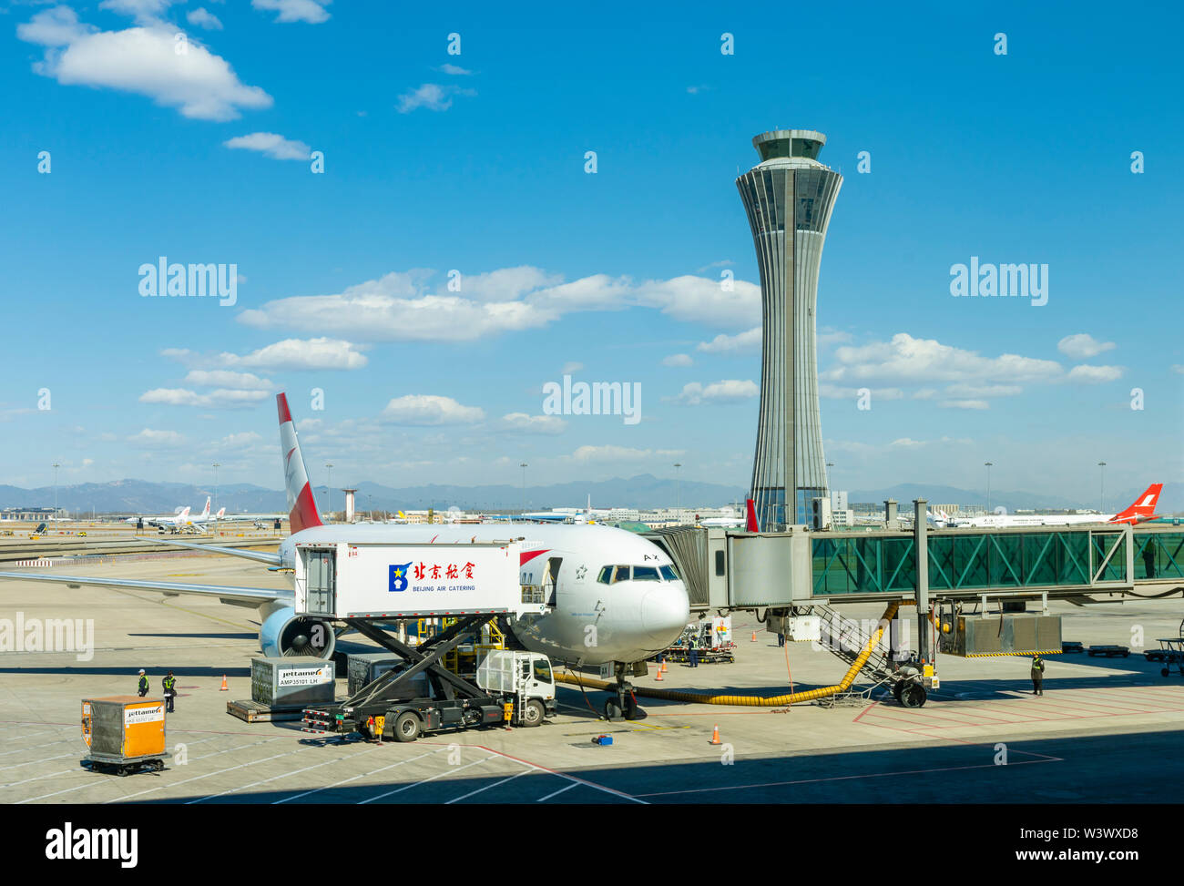 Passenger plane docked at Beijing Capital International Airport Stock Photo