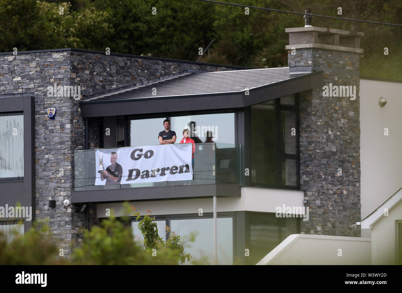 Spectators With A Banner Stock Photos Spectators With A Banner