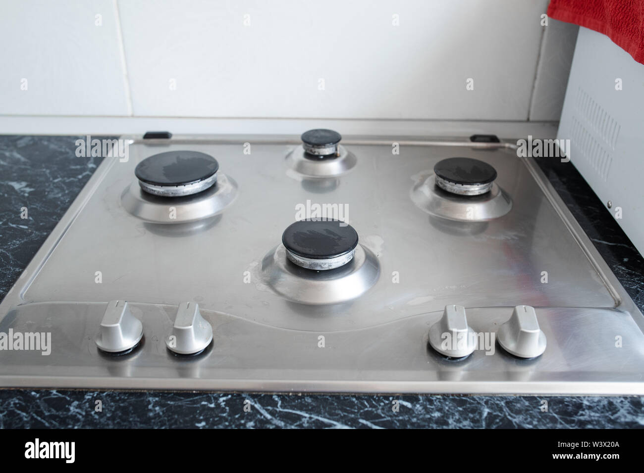 Polished gas cooker after washing.Perfectly clean gas cooker after being washed with polishing