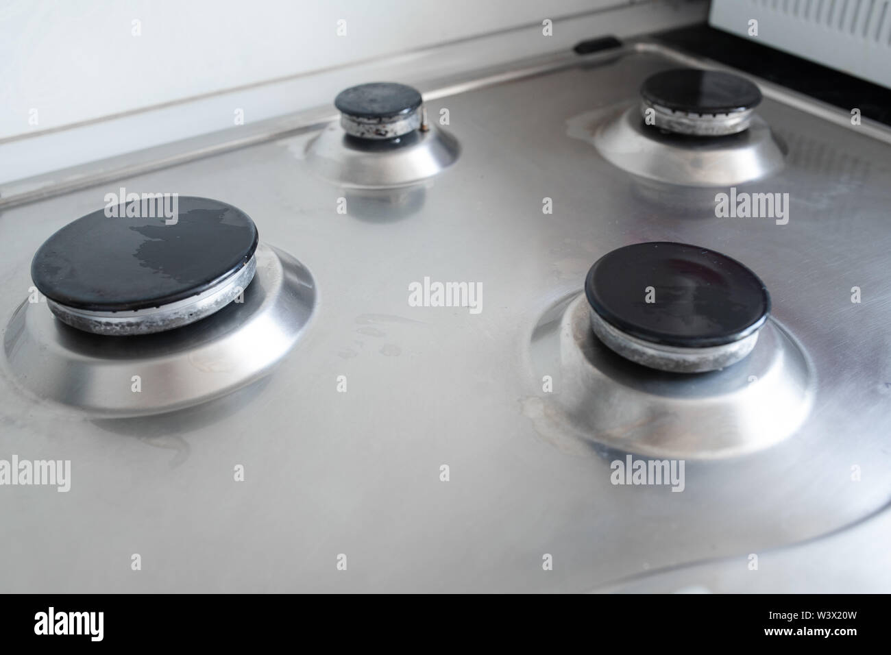 Polished gas cooker after washing.Perfectly clean gas cooker after being washed with polishing