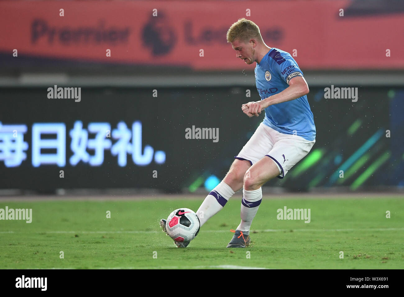 German football player Kevin De Bruyne of Manchester City F.C. of English League champions dribbles against West Ham United F.C. in the semifinal match of the Premier League Asia Trophy 2019 in Nanjing city, east China's Jiangsu province, 17 July 2019. Manchester City F.C. defeated West Ham United F.C. 4-1. Stock Photo