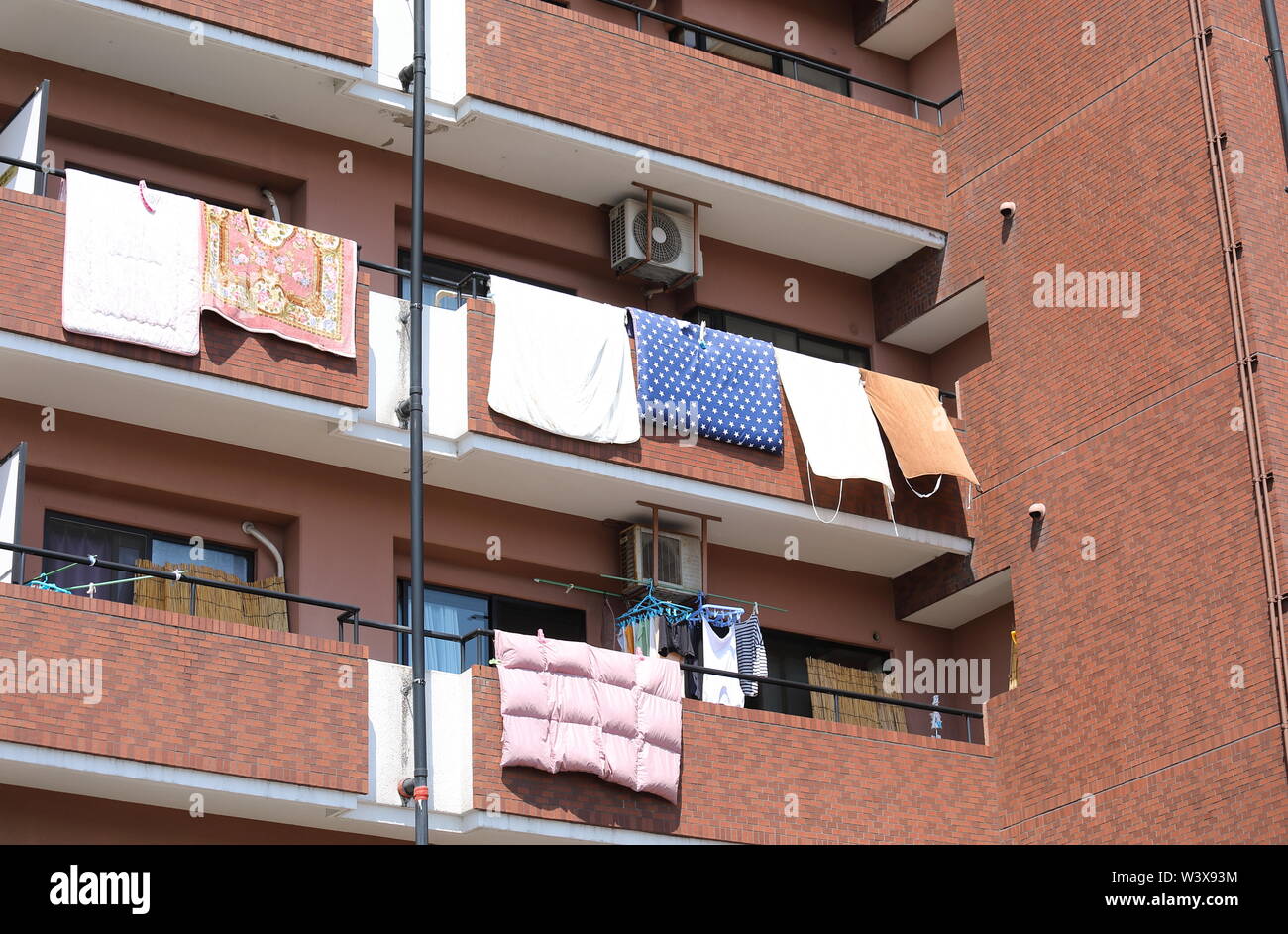 Laundry hanged on balconies in Japan Stock Photo Alamy
