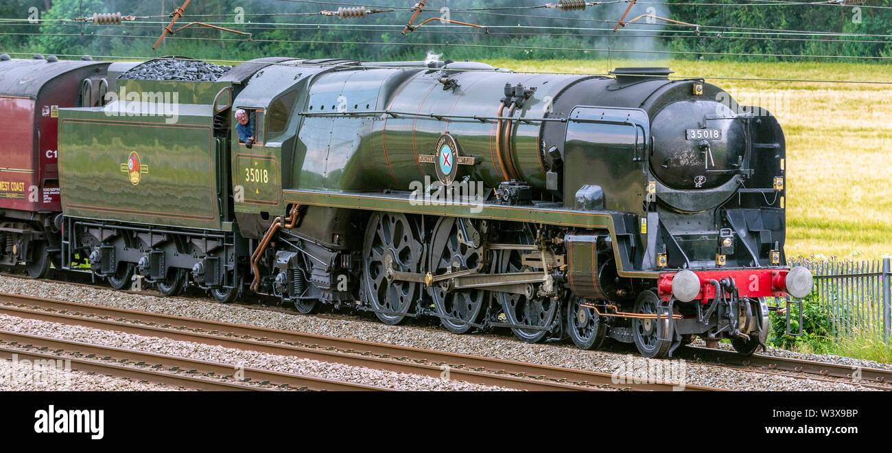 SR Merchant Navy Class 35018 British India Line pictured on the West Coast Main line at Winwick. Stock Photo
