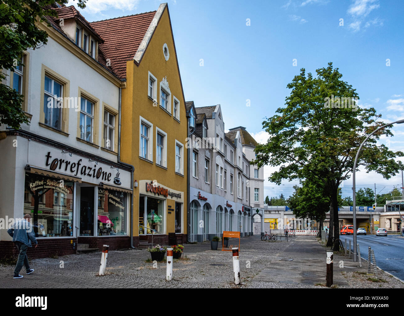 Oberhofer Weg Street view of Shops and old apartment buildings in
