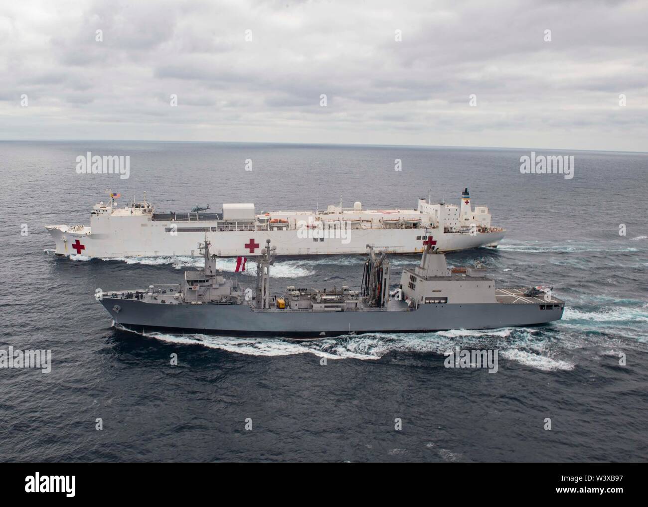 Royal Australian Navy 190716-n-mx527-1085-pacific-ocean-july-16-2019-the-hospital-ship-usns-comfort-t-ah-20-practices-a-replenishment-at-sea-with-the-peruvian-ship-bap-tacna-arl-158-comfort-is-working-with-health-and-government-partners-in-central-america-south-america-and-the-caribbean-to-provide-care-on-the-ship-and-at-land-based-medical-sites-helping-to-relieve-pressure-on-national-medical-systems-strained-by-an-increase-in-venezuelan-migrants-us-navy-photo-by-mass-communication-specialist-3rd-class-brendan-fitzgerald-W3XB97