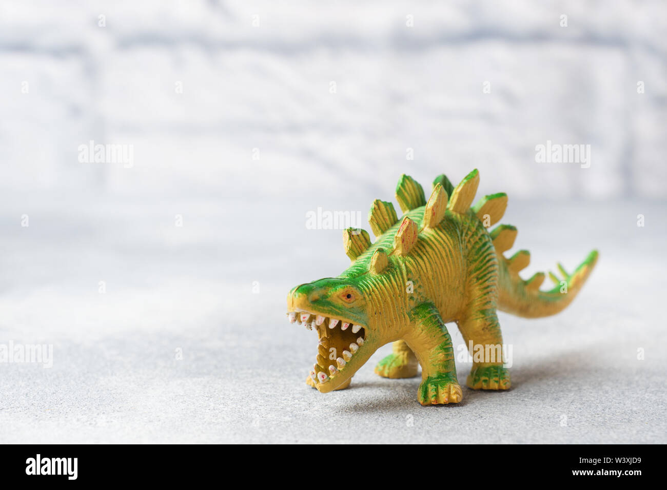 Dollhouse Miniature Rubber Plastic Toy Stegosaurus Dinosaur SL345522B 