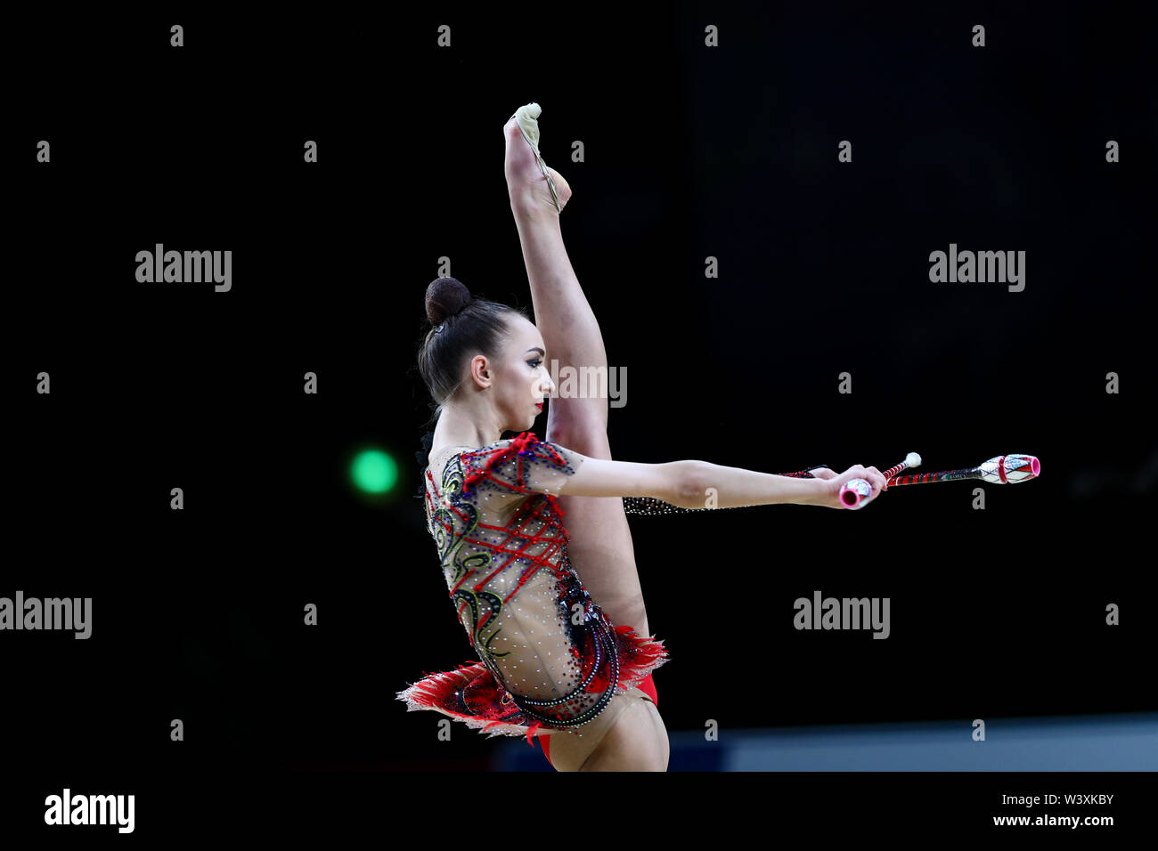Irina Annenkova from Russia performs her clubs routine during 2019 Grand Prix de Thiais Stock Photo