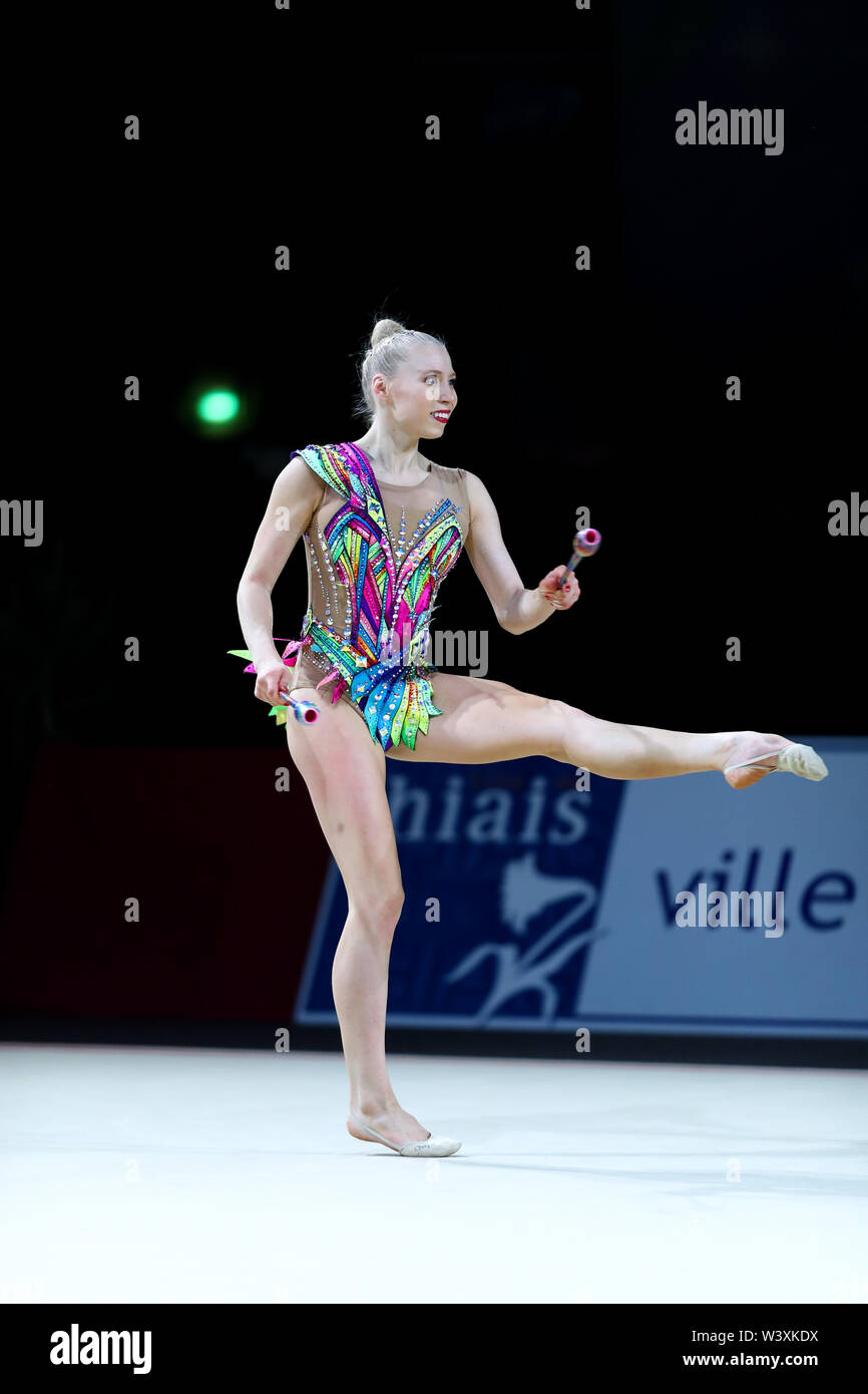 Kseniya Moustafaeva from France performs her clubs routine during 2019 Grand Prix de Thiais Stock Photo