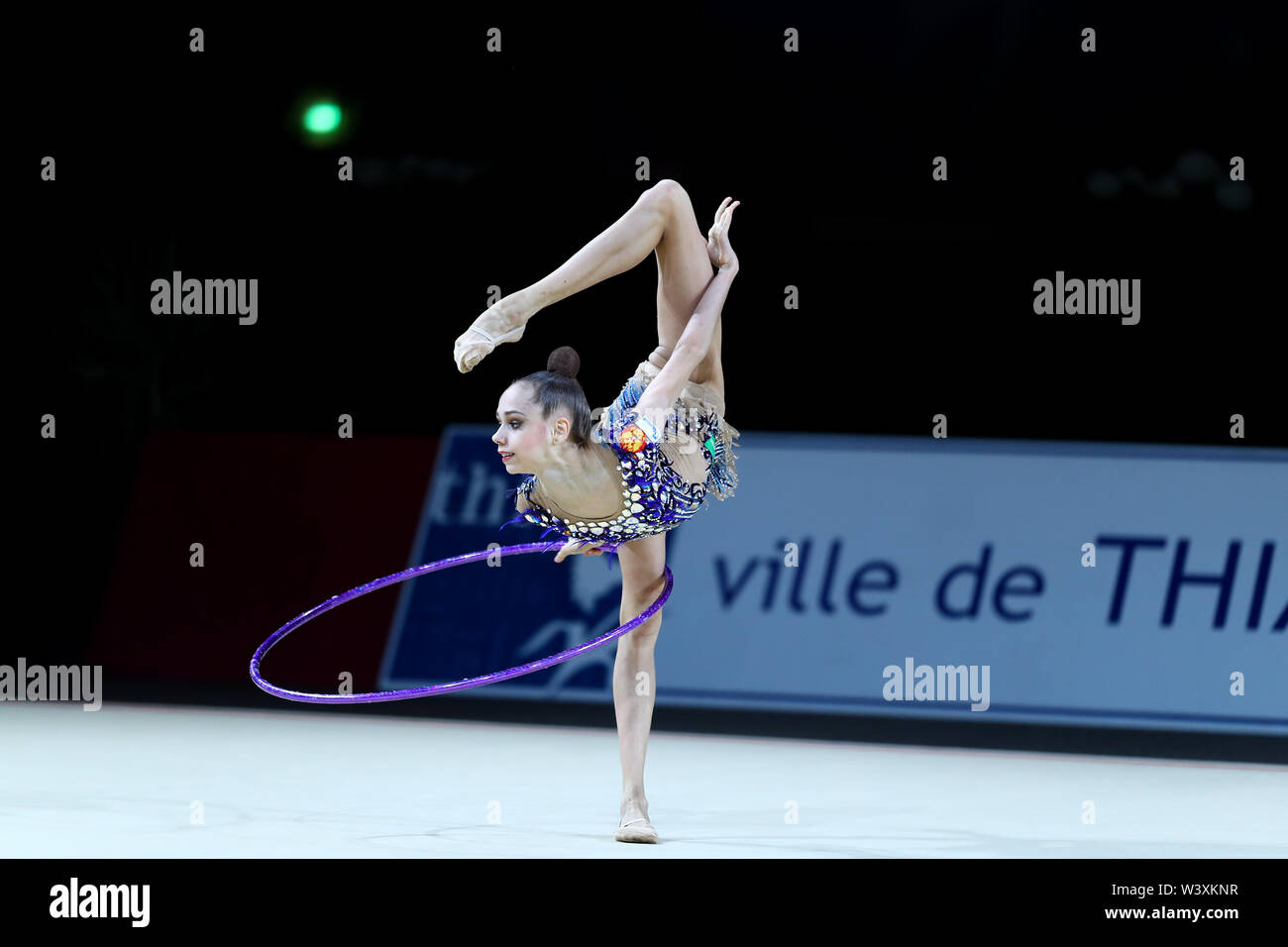Anastasia Guzenkova from Russia performs her hoop routine during 2019 Grand Prix de Thiais Stock Photo