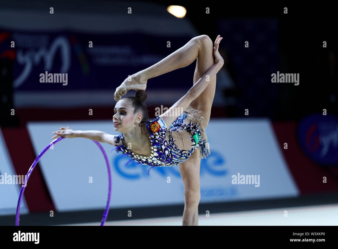 Anastasia Guzenkova from Russia performs her hoop routine during 2019 Grand Prix de Thiais Stock Photo