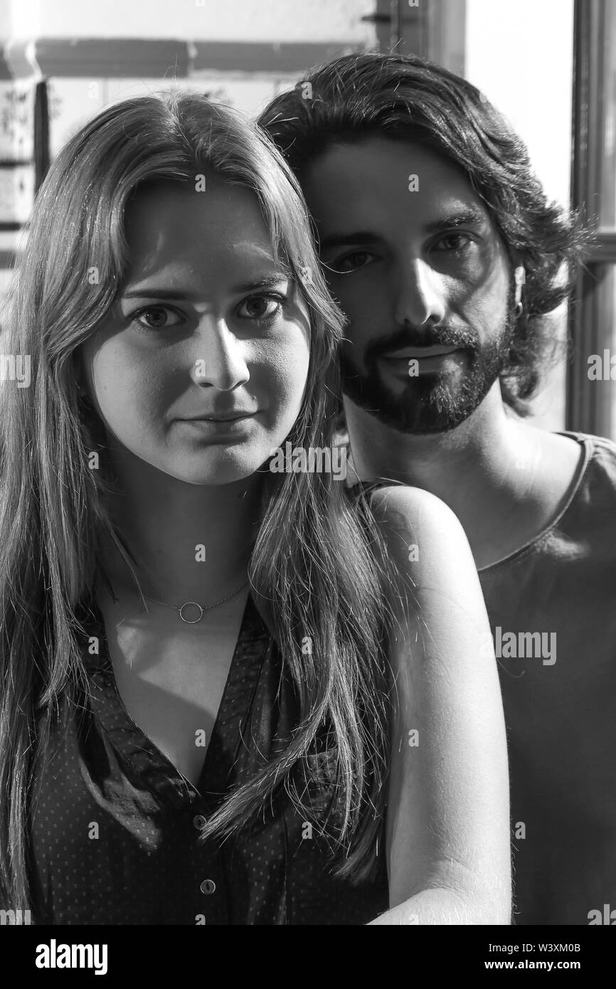 Black And White Portrait Of Young Couple Of Actors Looking At