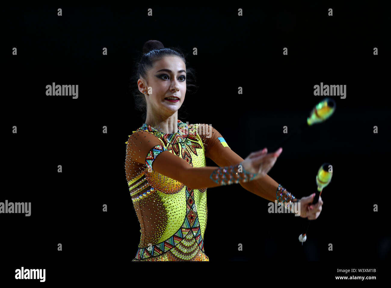 Yeva Meleshchuk from Ukraine performs her clubs routine during 2019 Grand Prix de Thiais Stock Photo