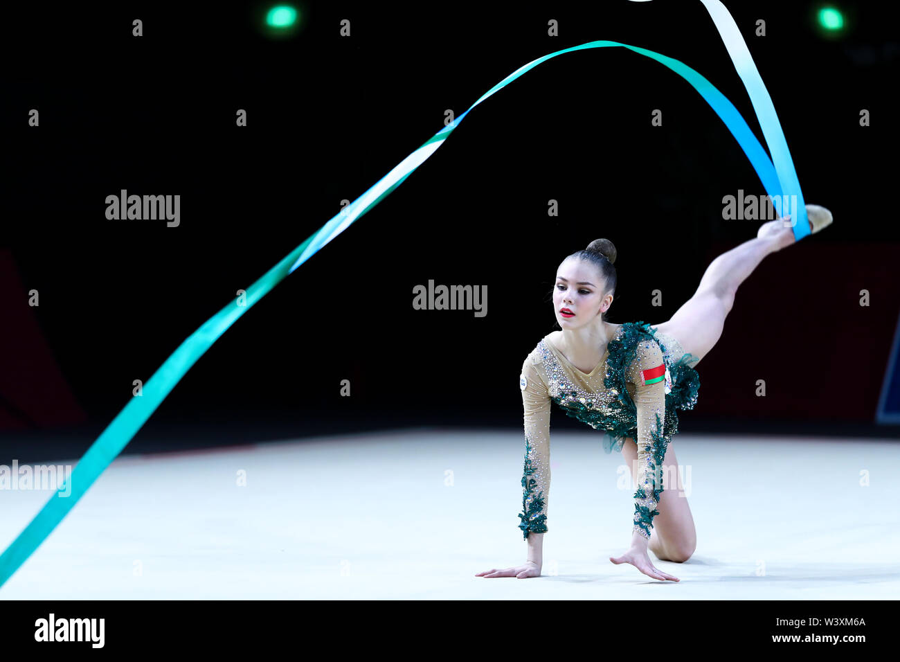 Anastasiia Salos from Belarus performs her ribbon routine during 2019 Grand Prix de Thiais Stock Photo