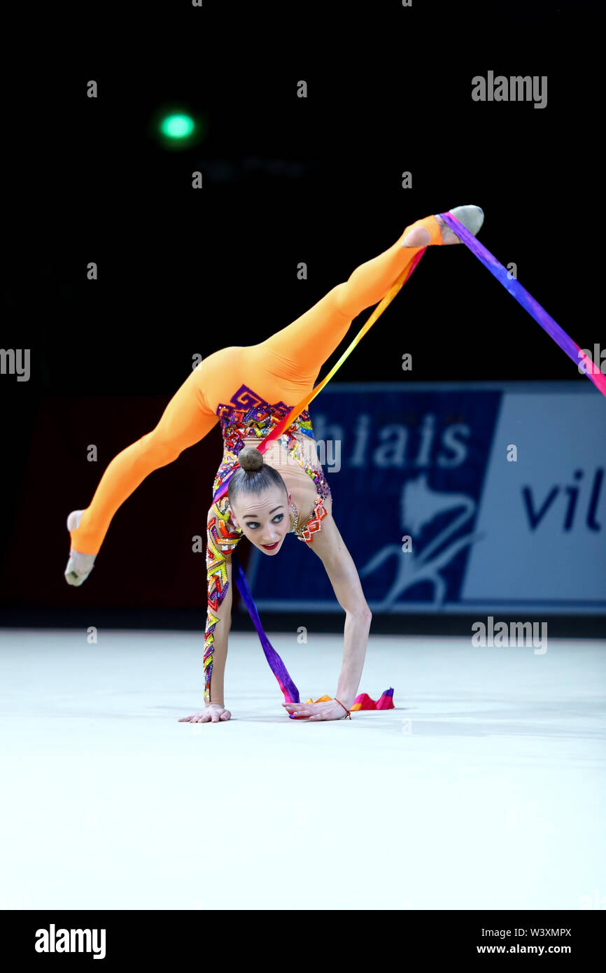 Khrystyna Pohranychna from Ukraine performs her ribbon routine during 2019 Grand Prix de Thiais Stock Photo