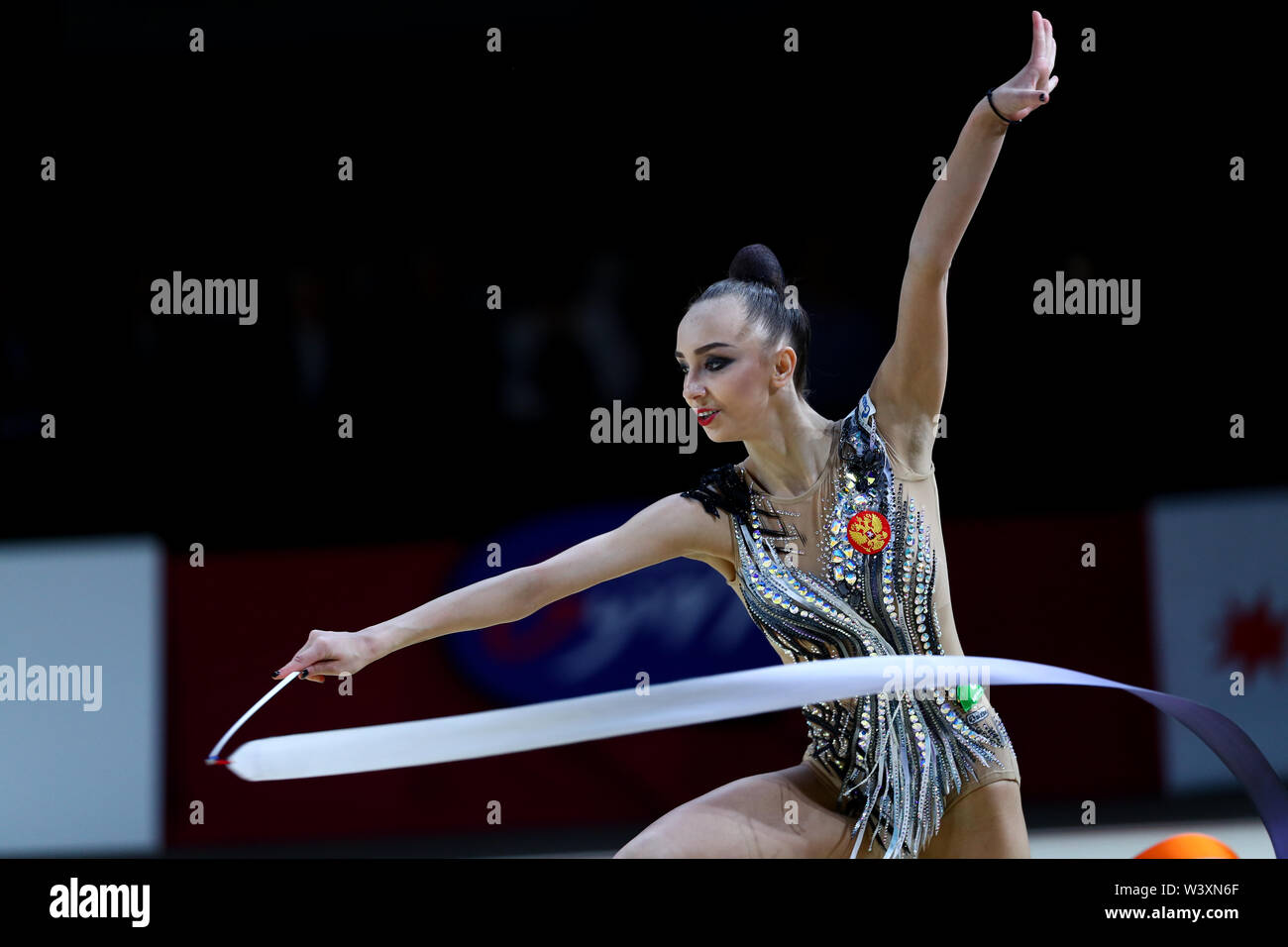 Irina Annenkova from Russia performs her ribbon routine during 2019 Grand Prix de Thiais Stock Photo