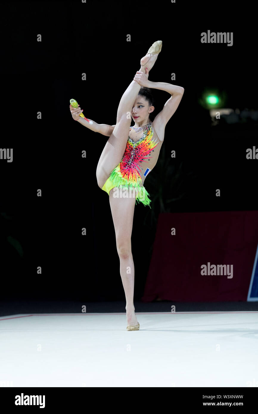Maena Millon from France performs her clubs routine during 2019 Grand Prix de Thiais Stock Photo