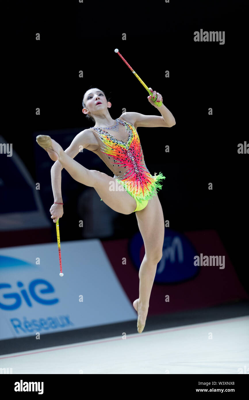 Maena Millon from France performs her clubs routine during 2019 Grand Prix de Thiais Stock Photo
