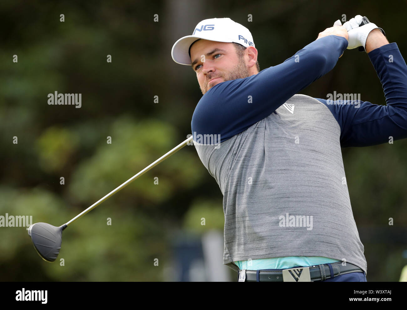 Canada's Corey Conners tees off the 5th during day one of The Open Championship 2019 at Royal Portrush Golf Club. Stock Photo