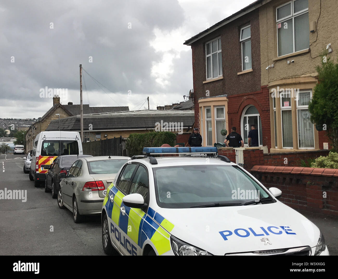 Police outside a property raided by counter terrorism officers on Manor ...