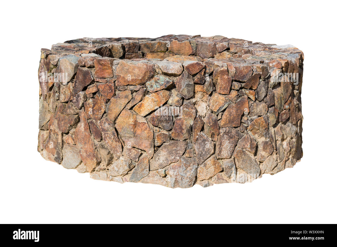Traditional Ancient stone well isolated on white background. Stock Photo