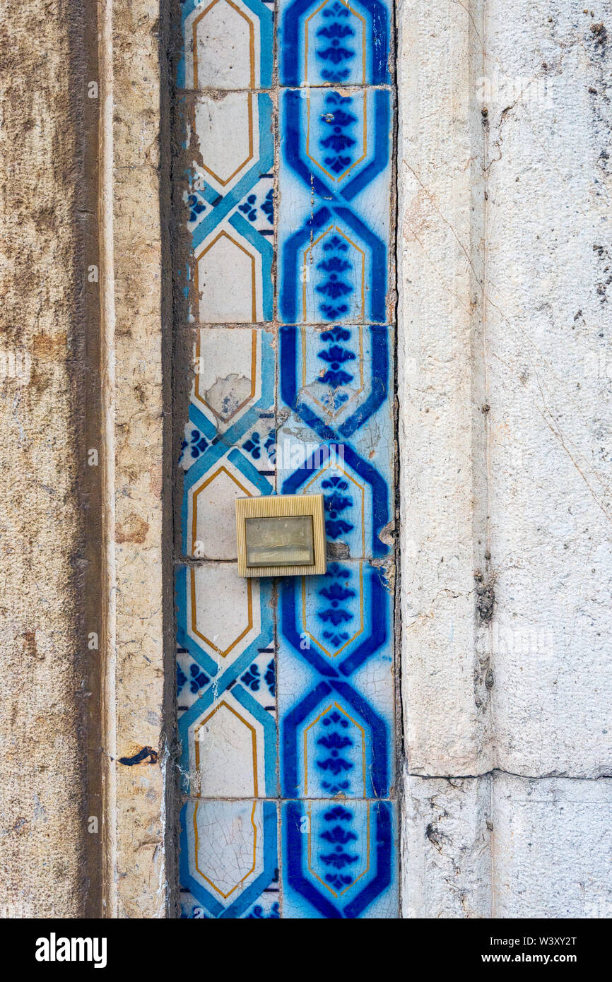 Close up on a traditional portuguese tiles Azulejos on the facade of a house in Olhao Portugal Stock Photo