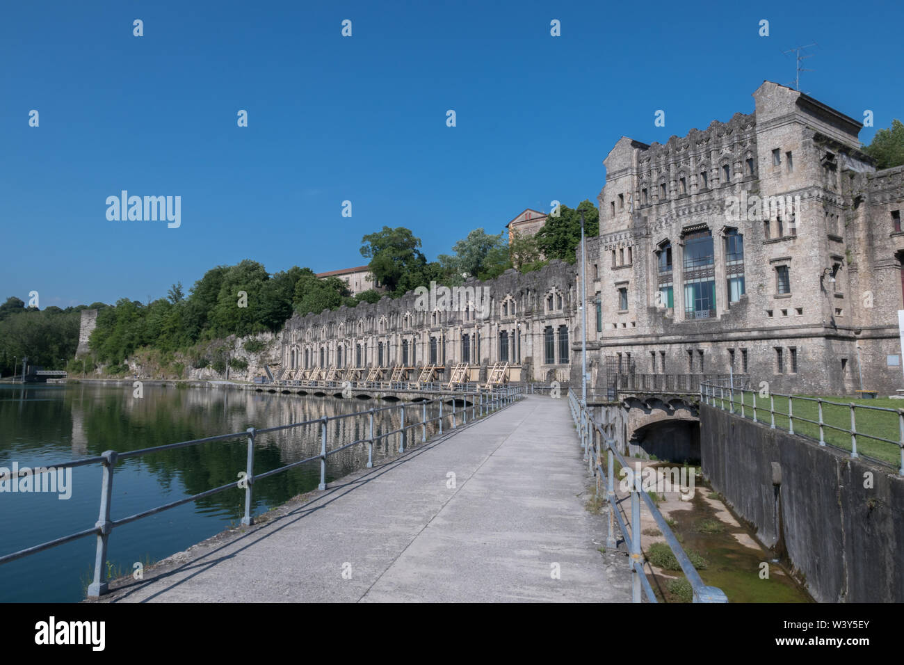 Taccani hydroelectric power plant and Visconteo Castle. Trezzo sull'Adda (MILAN), ITALY - May 31, 2019. Stock Photo