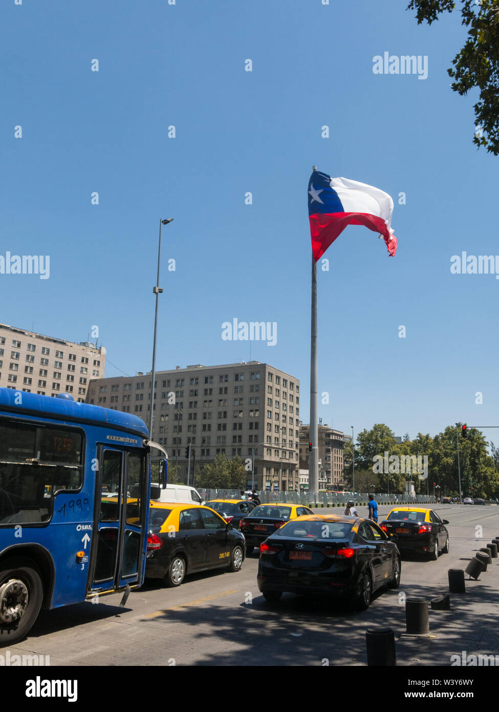 SANTIAGO DE CHILE, CHILE - JANUARY 26, 2018: Intense traffic on Avenida La Alameda, the most important street in Santiago de Chile. In the background, Stock Photo