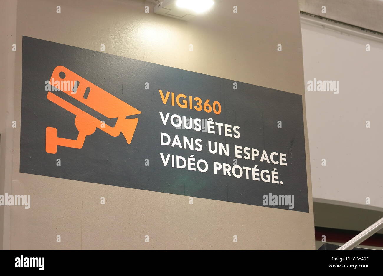 Security video camera warning sign Paris France Stock Photo - Alamy