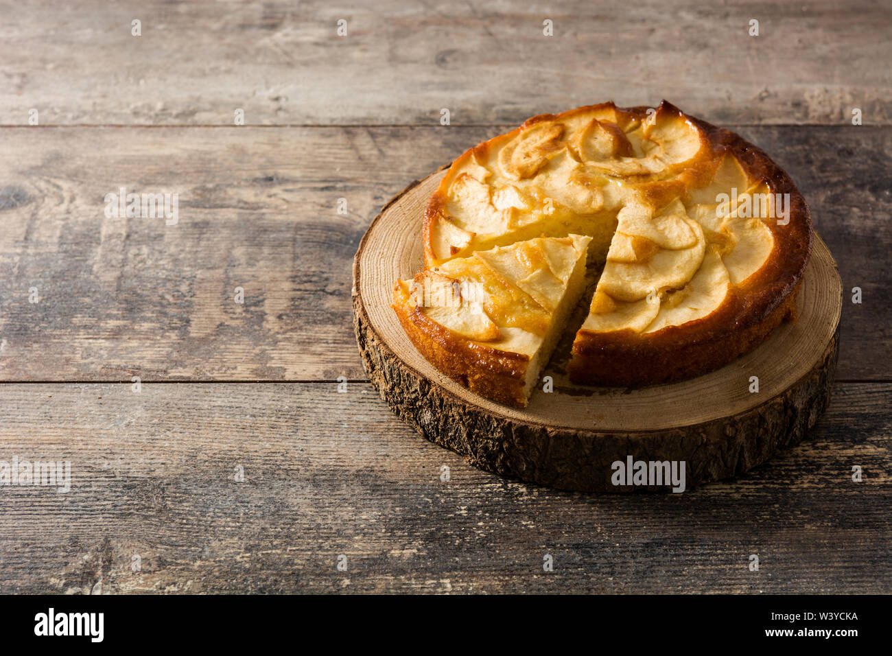 Homemade apple pie on wooden table. Copyspace Stock Photo